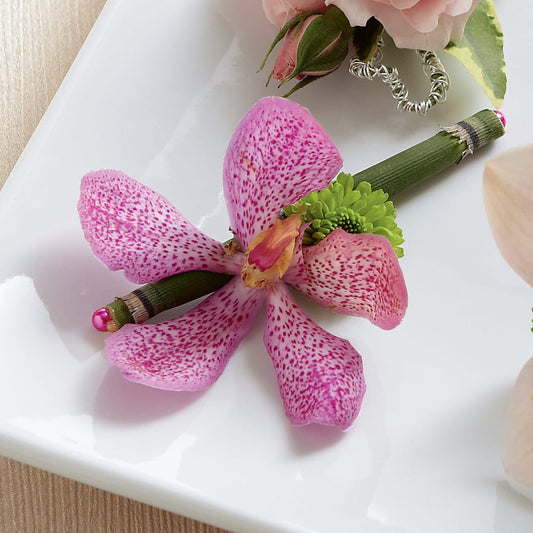 Pink Mokara Boutonniere – COCO'S FLOWER BAR, Mckinney TX